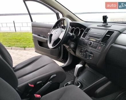 Чорний Ніссан Тііда, об'ємом двигуна 1.6 л та пробігом 114 тис. км за 6729 $, фото 7 на Automoto.ua