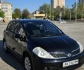 Черный Ниссан Тиида, объемом двигателя 0 л и пробегом 99 тыс. км за 6591 $, фото 1 на Automoto.ua