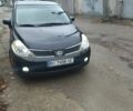 Черный Ниссан Тиида, объемом двигателя 1.6 л и пробегом 220 тыс. км за 5498 $, фото 1 на Automoto.ua