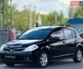 Чорний Ніссан Тііда, об'ємом двигуна 1.6 л та пробігом 135 тис. км за 6899 $, фото 1 на Automoto.ua
