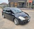 Черный Ниссан Тиида, объемом двигателя 1.6 л и пробегом 192 тыс. км за 6800 $, фото 9 на Automoto.ua