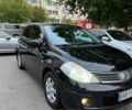 Черный Ниссан Тиида, объемом двигателя 1.6 л и пробегом 230 тыс. км за 4900 $, фото 1 на Automoto.ua