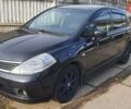 Черный Ниссан Тиида, объемом двигателя 1.6 л и пробегом 229 тыс. км за 5900 $, фото 1 на Automoto.ua