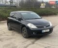 Черный Ниссан Тиида, объемом двигателя 1.6 л и пробегом 177 тыс. км за 6200 $, фото 1 на Automoto.ua