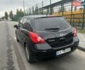 Черный Ниссан Тиида, объемом двигателя 1.6 л и пробегом 129 тыс. км за 5500 $, фото 1 на Automoto.ua
