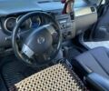 Черный Ниссан Тиида, объемом двигателя 1.6 л и пробегом 218 тыс. км за 5600 $, фото 14 на Automoto.ua