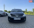 Черный Ниссан Тиида, объемом двигателя 1.8 л и пробегом 140 тыс. км за 5200 $, фото 1 на Automoto.ua