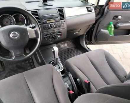 Черный Ниссан Тиида, объемом двигателя 1.6 л и пробегом 114 тыс. км за 6900 $, фото 9 на Automoto.ua