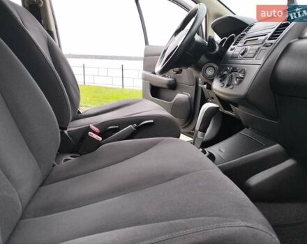 Черный Ниссан Тиида, объемом двигателя 1.6 л и пробегом 114 тыс. км за 6900 $, фото 12 на Automoto.ua