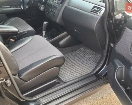 Черный Ниссан Тиида, объемом двигателя 1.6 л и пробегом 229 тыс. км за 5900 $, фото 7 на Automoto.ua