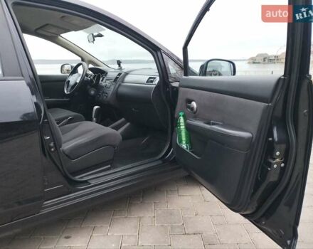 Чорний Ніссан Тііда, об'ємом двигуна 1.6 л та пробігом 114 тис. км за 6729 $, фото 33 на Automoto.ua