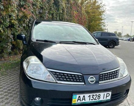 Черный Ниссан Тиида, объемом двигателя 1.6 л и пробегом 117 тыс. км за 7400 $, фото 2 на Automoto.ua