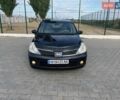 Черный Ниссан Тиида, объемом двигателя 1.6 л и пробегом 229 тыс. км за 6800 $, фото 1 на Automoto.ua