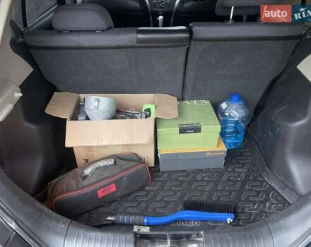 Черный Ниссан Тиида, объемом двигателя 1.6 л и пробегом 188 тыс. км за 6700 $, фото 18 на Automoto.ua