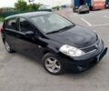 Черный Ниссан Тиида, объемом двигателя 1.6 л и пробегом 215 тыс. км за 5500 $, фото 1 на Automoto.ua