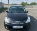 Чорний Ніссан Тііда, об'ємом двигуна 1.6 л та пробігом 200 тис. км за 4803 $, фото 1 на Automoto.ua