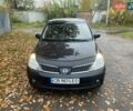 Черный Ниссан Тиида, объемом двигателя 1.6 л и пробегом 188 тыс. км за 6700 $, фото 3 на Automoto.ua