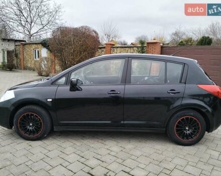 Черный Ниссан Тиида, объемом двигателя 1.6 л и пробегом 114 тыс. км за 6900 $, фото 44 на Automoto.ua