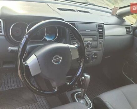 Черный Ниссан Тиида, объемом двигателя 1.6 л и пробегом 229 тыс. км за 5900 $, фото 1 на Automoto.ua