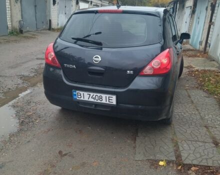Черный Ниссан Тиида, объемом двигателя 1.6 л и пробегом 220 тыс. км за 5498 $, фото 1 на Automoto.ua