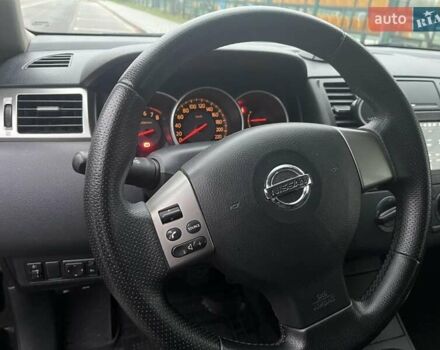 Черный Ниссан Тиида, объемом двигателя 1.6 л и пробегом 129 тыс. км за 5500 $, фото 4 на Automoto.ua