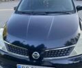 Черный Ниссан Тиида, объемом двигателя 1.6 л и пробегом 218 тыс. км за 5600 $, фото 1 на Automoto.ua