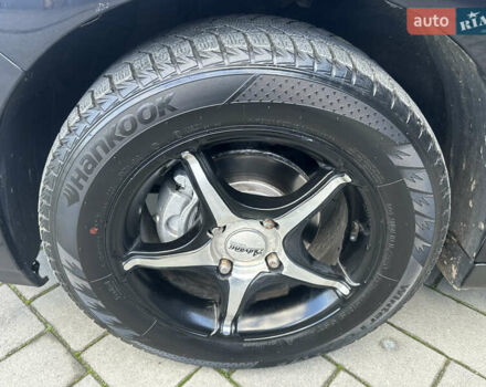 Черный Ниссан Тиида, объемом двигателя 1.6 л и пробегом 169 тыс. км за 6200 $, фото 19 на Automoto.ua