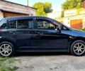 Черный Ниссан Тиида, объемом двигателя 1.6 л и пробегом 155 тыс. км за 5999 $, фото 7 на Automoto.ua