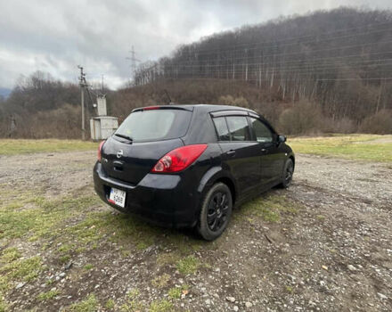 Черный Ниссан Тиида, объемом двигателя 1.6 л и пробегом 138 тыс. км за 6400 $, фото 14 на Automoto.ua