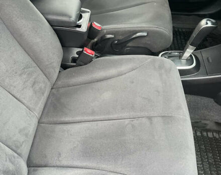 Черный Ниссан Тиида, объемом двигателя 1.6 л и пробегом 138 тыс. км за 6400 $, фото 23 на Automoto.ua