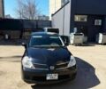 Черный Ниссан Тиида, объемом двигателя 1.6 л и пробегом 253 тыс. км за 6500 $, фото 1 на Automoto.ua