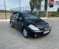 Черный Ниссан Тиида, объемом двигателя 1.6 л и пробегом 229 тыс. км за 6800 $, фото 1 на Automoto.ua