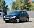 Чорний Ніссан Тііда, об'ємом двигуна 1.6 л та пробігом 112 тис. км за 7555 $, фото 1 на Automoto.ua
