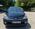 Черный Ниссан Тиида, объемом двигателя 1.6 л и пробегом 308 тыс. км за 5300 $, фото 1 на Automoto.ua