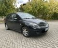 Чорний Ніссан Тііда, об'ємом двигуна 1.6 л та пробігом 179 тис. км за 5700 $, фото 1 на Automoto.ua