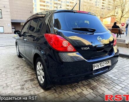 Черный Ниссан Тиида, объемом двигателя 1.6 л и пробегом 282 тыс. км за 4950 $, фото 2 на Automoto.ua