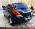 Черный Ниссан Тиида, объемом двигателя 1.6 л и пробегом 282 тыс. км за 4950 $, фото 2 на Automoto.ua
