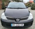 Черный Ниссан Тиида, объемом двигателя 1.6 л и пробегом 114 тыс. км за 6900 $, фото 4 на Automoto.ua