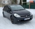 Черный Ниссан Тиида, объемом двигателя 1.6 л и пробегом 177 тыс. км за 5800 $, фото 1 на Automoto.ua