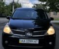 Черный Ниссан Тиида, объемом двигателя 0 л и пробегом 320 тыс. км за 4700 $, фото 1 на Automoto.ua