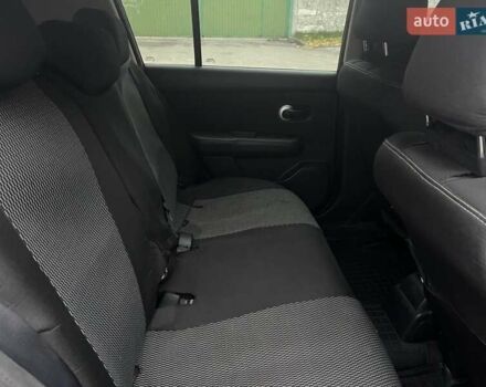 Черный Ниссан Тиида, объемом двигателя 1.6 л и пробегом 129 тыс. км за 5500 $, фото 3 на Automoto.ua