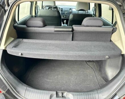 Черный Ниссан Тиида, объемом двигателя 1.6 л и пробегом 117 тыс. км за 7400 $, фото 19 на Automoto.ua