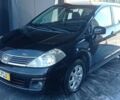 Черный Ниссан Тиида, объемом двигателя 1.6 л и пробегом 182 тыс. км за 7200 $, фото 1 на Automoto.ua