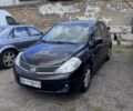 Черный Ниссан Тиида, объемом двигателя 1.6 л и пробегом 300 тыс. км за 4800 $, фото 1 на Automoto.ua