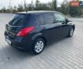 Черный Ниссан Тиида, объемом двигателя 1.6 л и пробегом 229 тыс. км за 6800 $, фото 2 на Automoto.ua