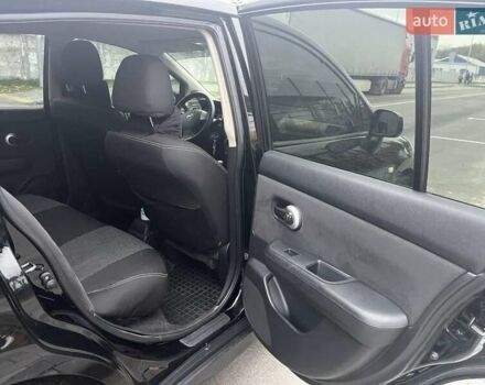 Черный Ниссан Тиида, объемом двигателя 1.6 л и пробегом 129 тыс. км за 5500 $, фото 1 на Automoto.ua