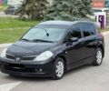 Черный Ниссан Тиида, объемом двигателя 1.6 л и пробегом 170 тыс. км за 5999 $, фото 1 на Automoto.ua