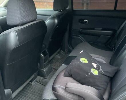 Черный Ниссан Тиида, объемом двигателя 1.6 л и пробегом 188 тыс. км за 6700 $, фото 13 на Automoto.ua