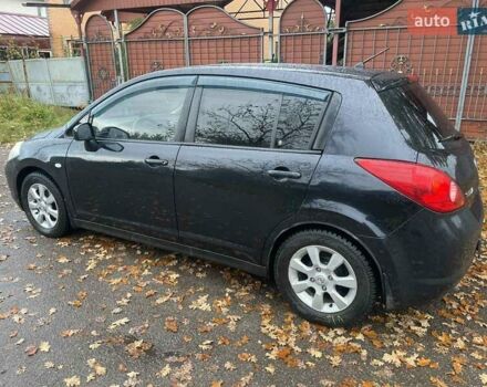 Черный Ниссан Тиида, объемом двигателя 1.6 л и пробегом 188 тыс. км за 6700 $, фото 1 на Automoto.ua