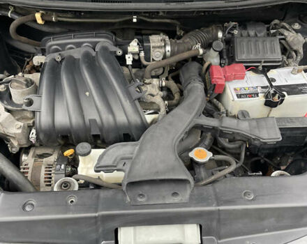 Черный Ниссан Тиида, объемом двигателя 1.6 л и пробегом 138 тыс. км за 6400 $, фото 31 на Automoto.ua